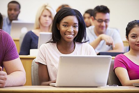 Female University Student Using Laptop In Lecture HSKL
